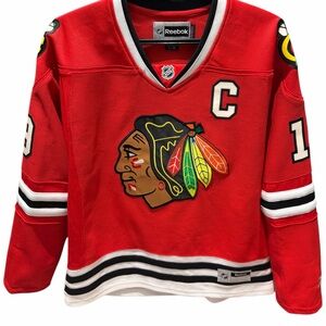 Women’s large Reebok Chicago Blackhawks Toews NHL Jersey